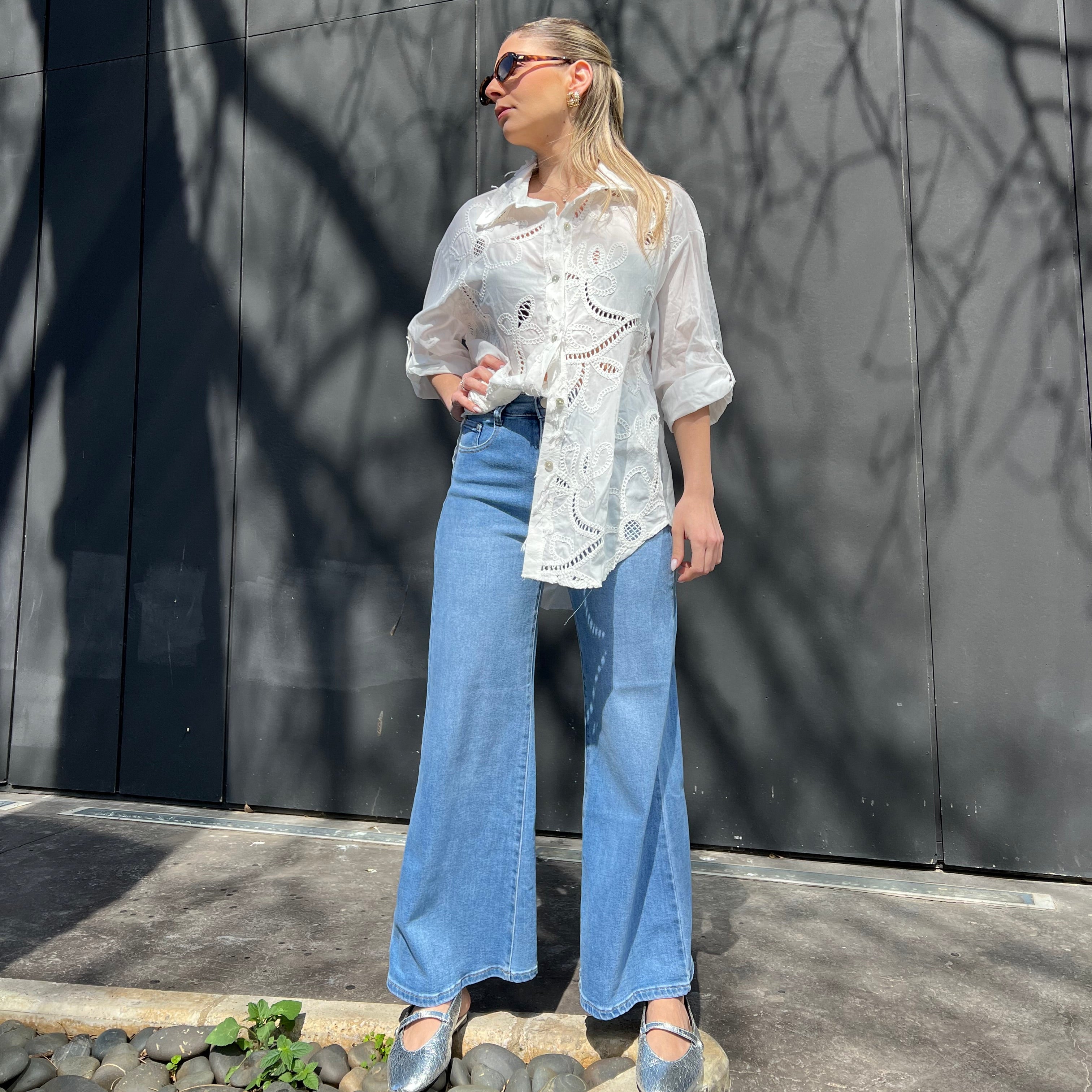 White shirt with embroidered patterns