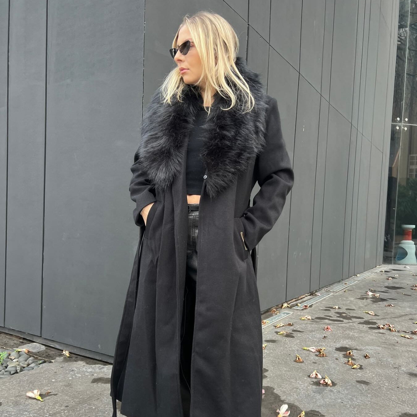 Long coat with faux fur collar