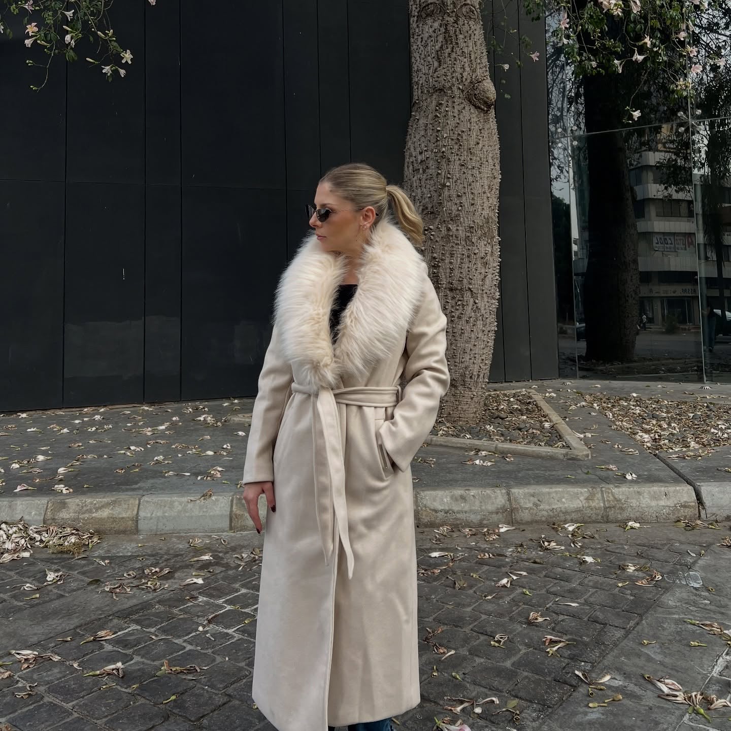 Long coat with faux fur collar