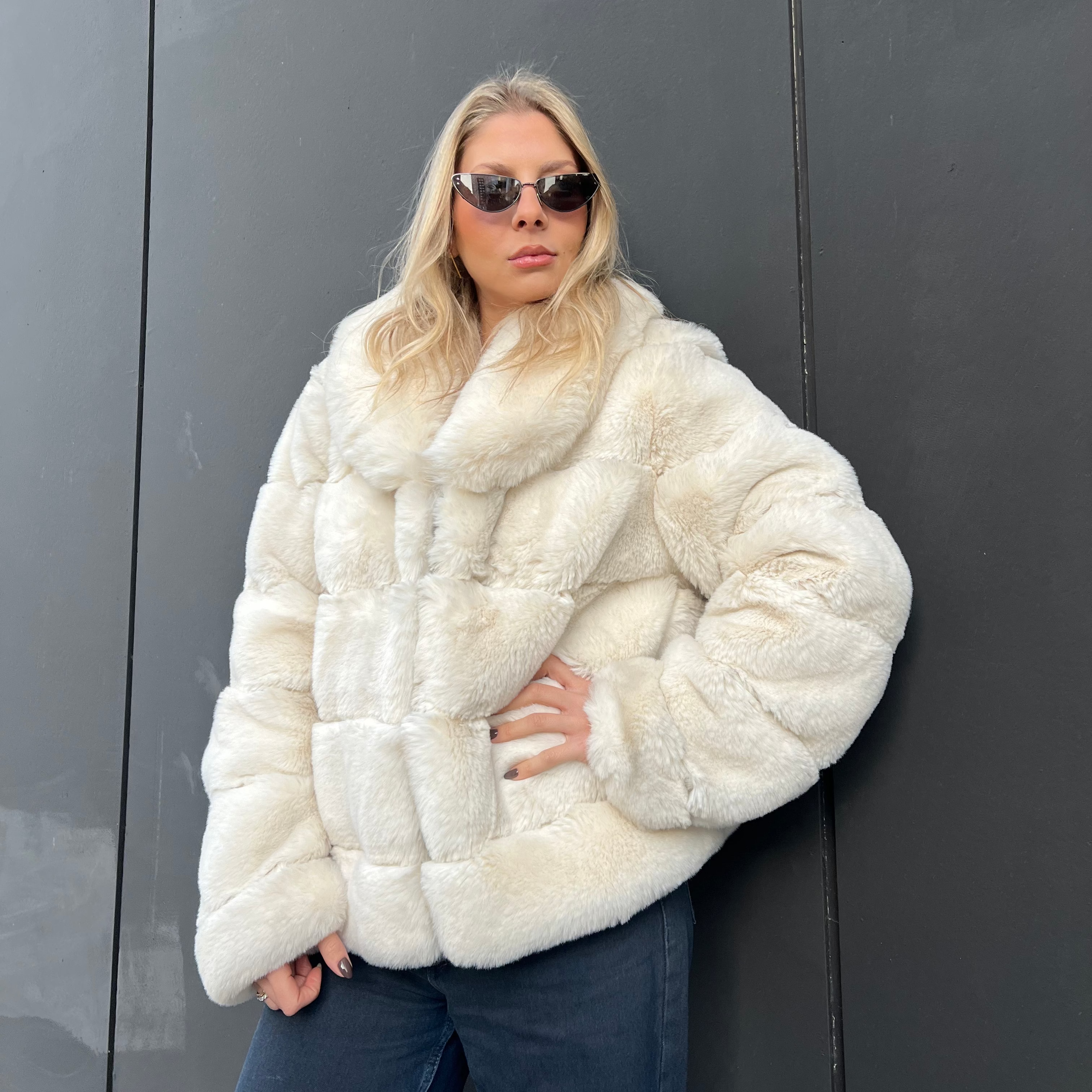 Faux fur coat with lapel collar