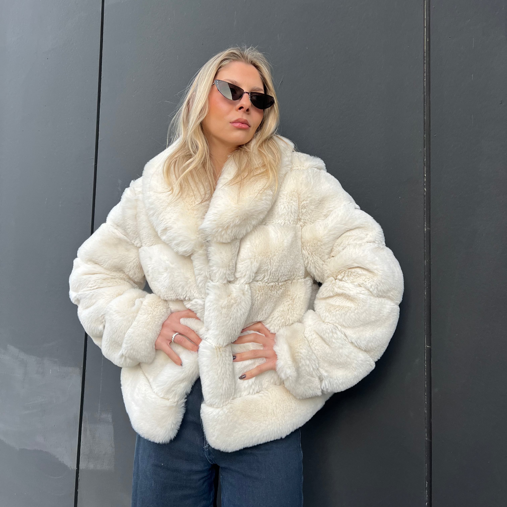 Faux fur coat with lapel collar