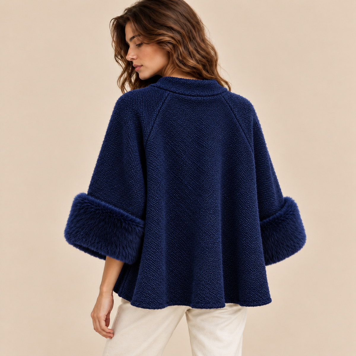 Knit Cape Jacket With Faux Fur Cuffs in Black, model back view