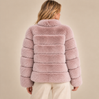 Panelled Faux Fur Jacket With Stand Collar in Baby Pink, model back view
